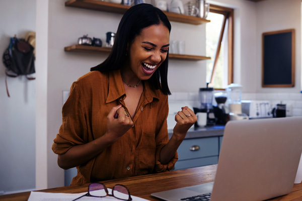 lady on the computer exciteed