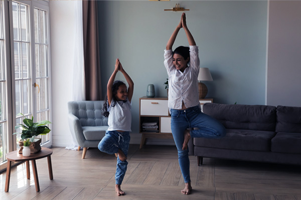 Mother and daughter yoga in a house picture